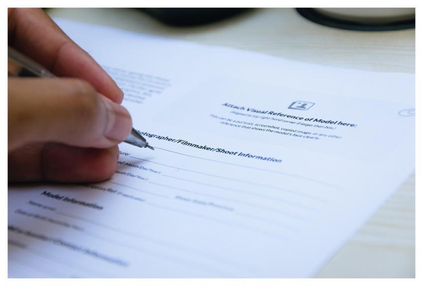 Signing Paper Hand Close Up
