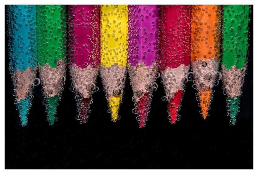 Colorful Pencils Submerged Underwater