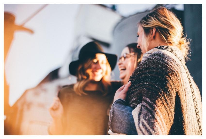 Happy Holidays Women Talking Laugh