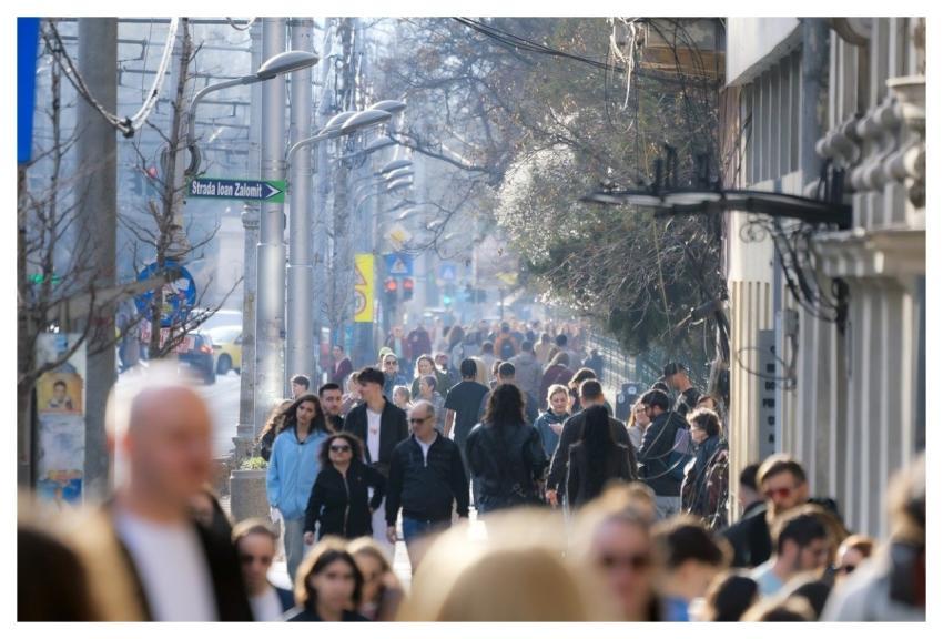 People Crowd Sidewalk Street