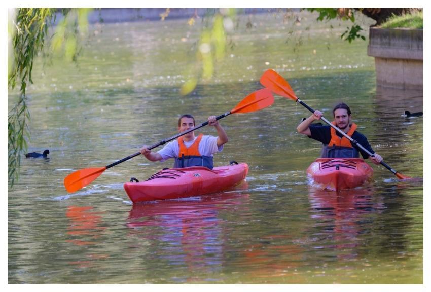 Boys Rowing Kayak Water