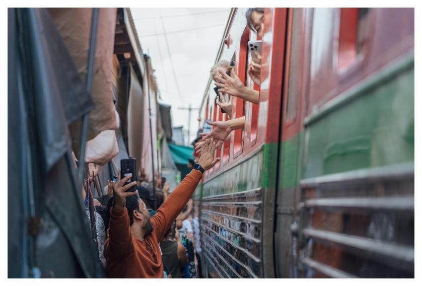 Thailand Train High Five Interaction