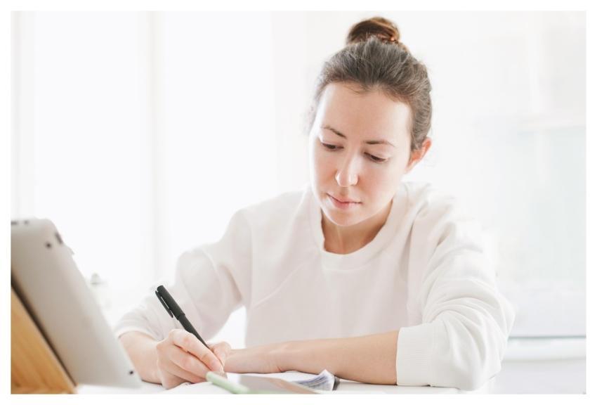 Learning Concept Young Woman Studying With A Table