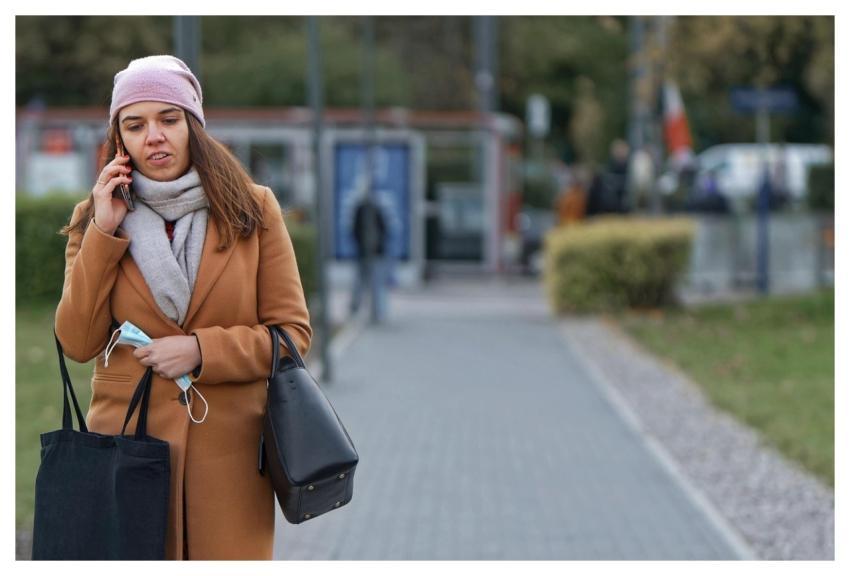 Woman Overcoat Bag Talking