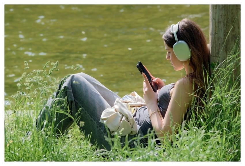 Girl Relaxing Lakeshore Park