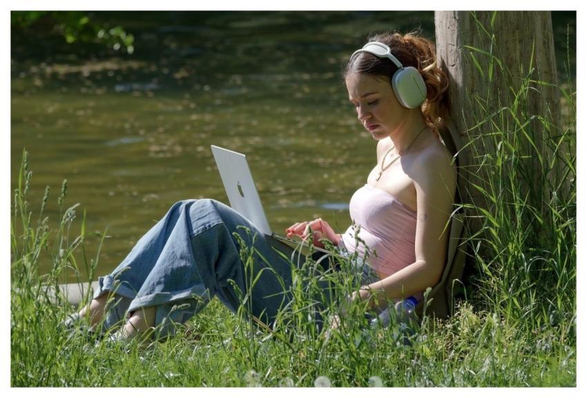 Girl Relaxing Lakeshore Park