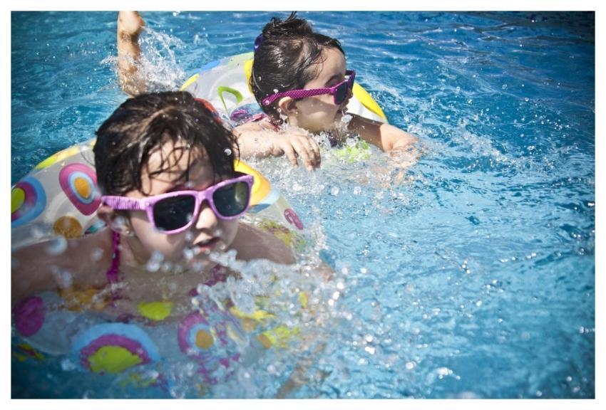 Girls Swimming Splashing Sisters