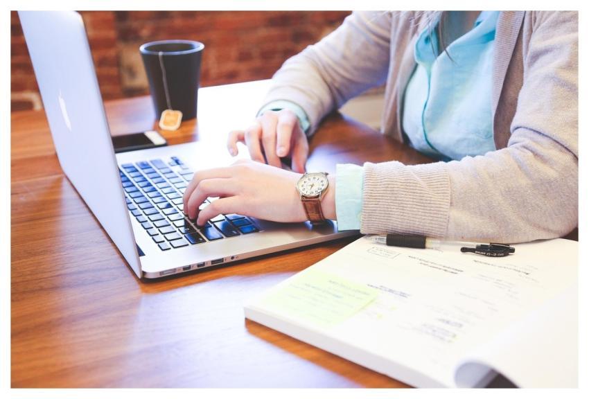 Student Typing Keyboard Text