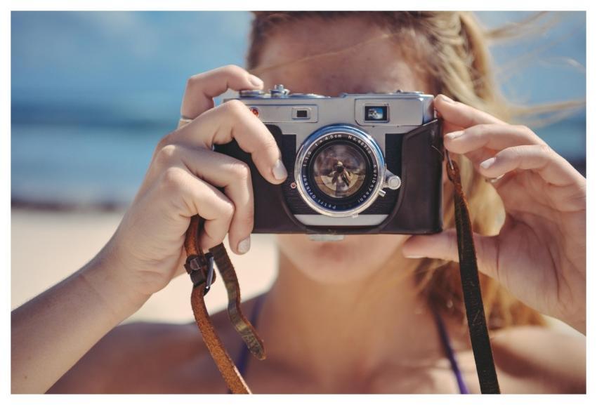 Blonde Girl Taking Photo