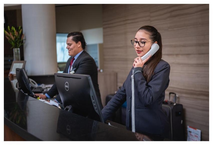 Receptionists Phone Call Hotel Reception