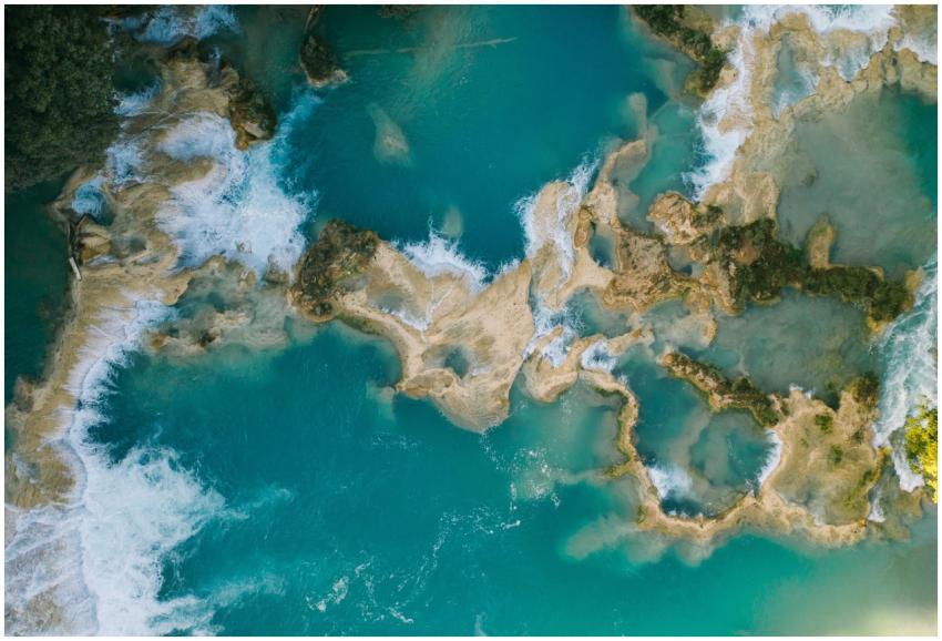 Stunning aerial capture of turquoise waterfalls in