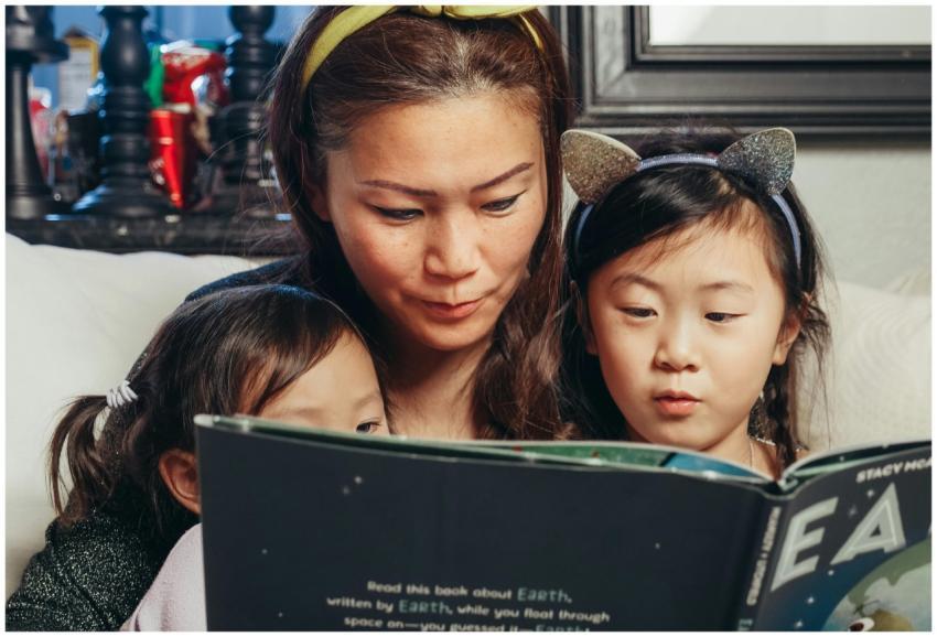 A mother enjoys quality reading time with her youn