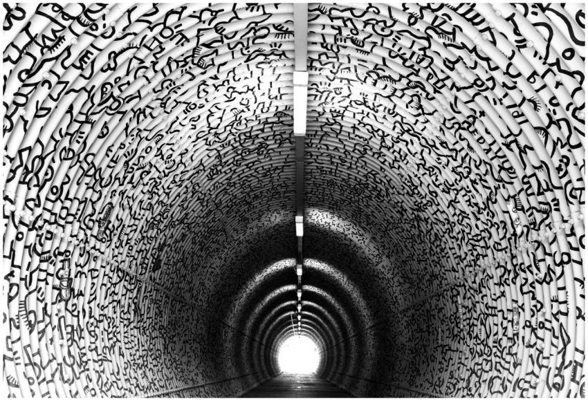 Explore the depths of a modern graffiti-covered tu