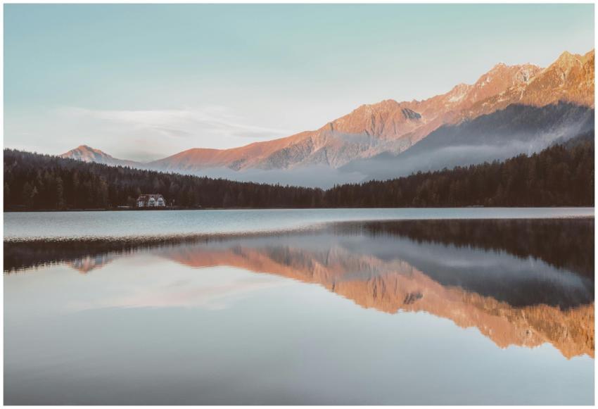 Serene mountain landscape with lake reflection at