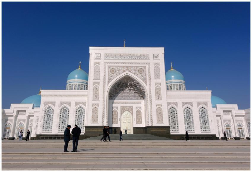 Beautiful mosque with blue domes and intricate pat