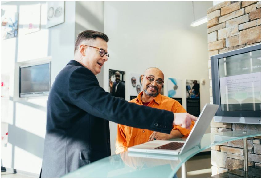 Two businessmen having a lively discussion in a mo