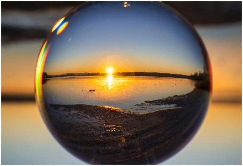 A mesmerizing sunset viewed through a glass sphere