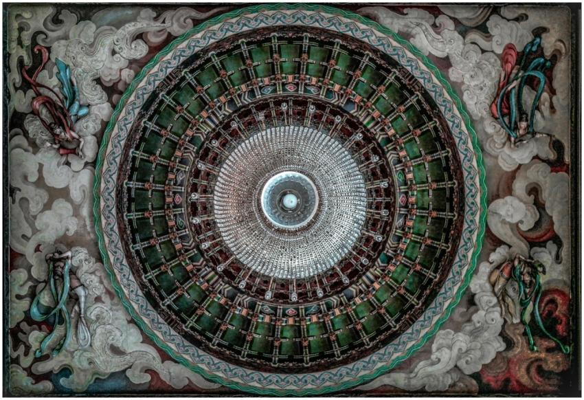 A beautifully detailed ceiling featuring an ornate