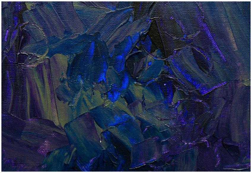 A close-up of vibrant abstract acrylic art with ri