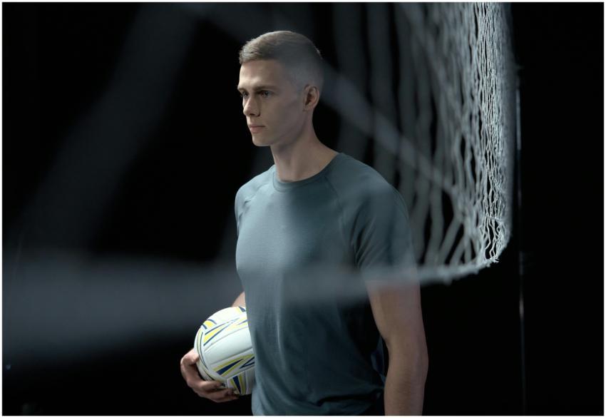 Profile image of a male volleyball player holding
