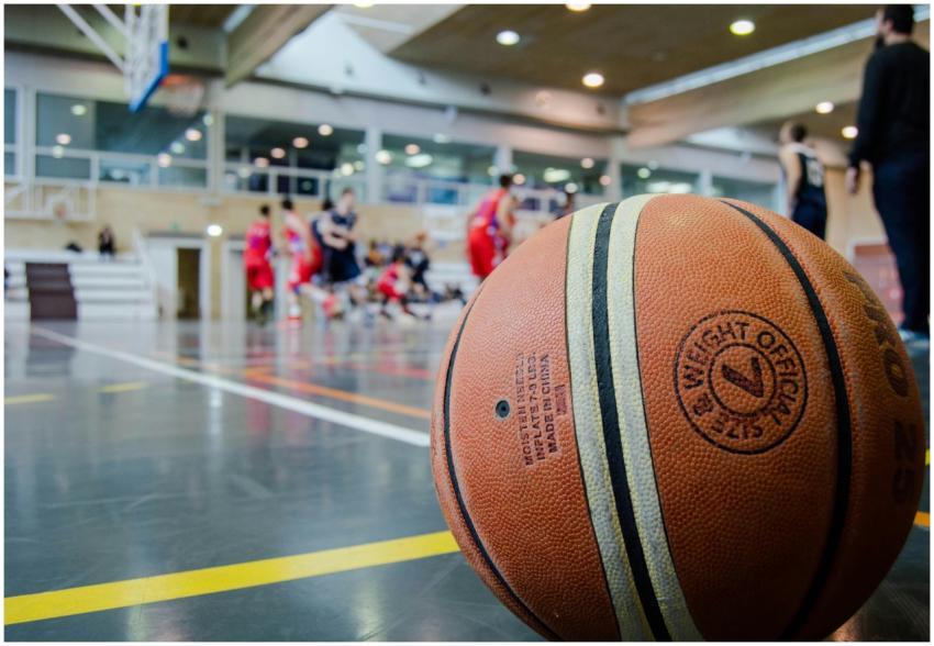 Captivating indoor basketball scene with players a