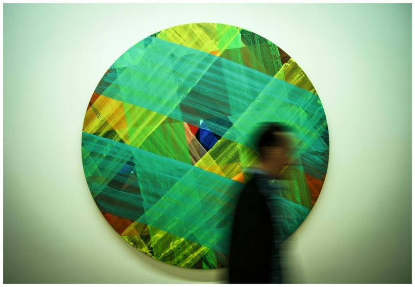 Abstract circular artwork with vivid colors and a