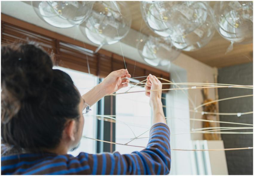 Artist working on a contemporary art installation