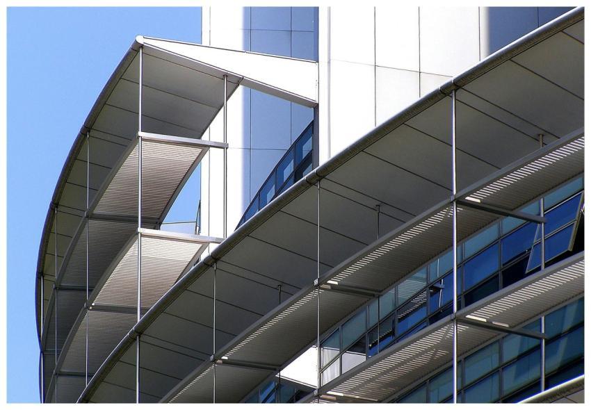 Close-up of a futuristic building facade with glas