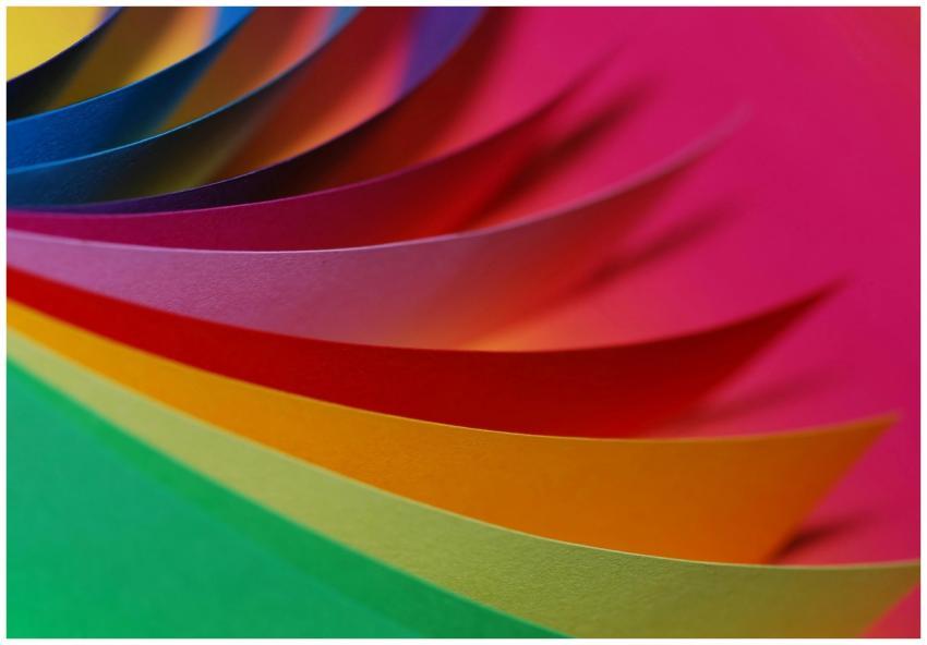 Vibrant layers of colorful paper arranged in a dyn
