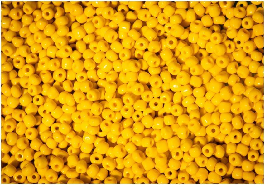 A vibrant collection of glossy yellow beads perfec