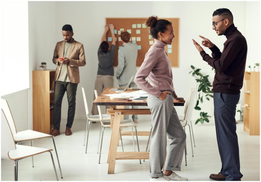 Colleagues engaging in teamwork and brainstorming