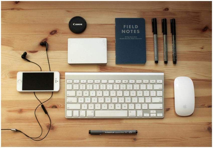 Top view of a modern desk setup featuring electron