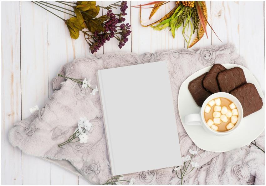 Warm and inviting flat lay with hot chocolate, coo