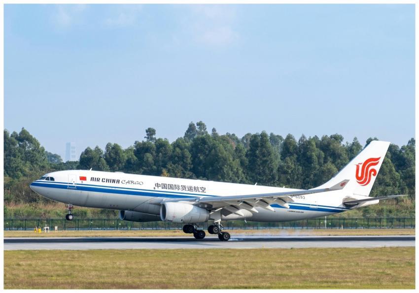 Air China Cargo aircraft lifting off against a cle