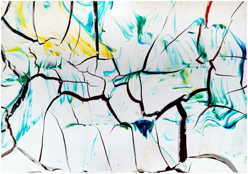 Vivid abstract artwork featuring cracked paint wit