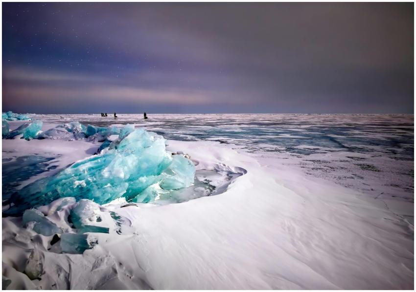 Majestic view of a frozen lake with blue ice chunk