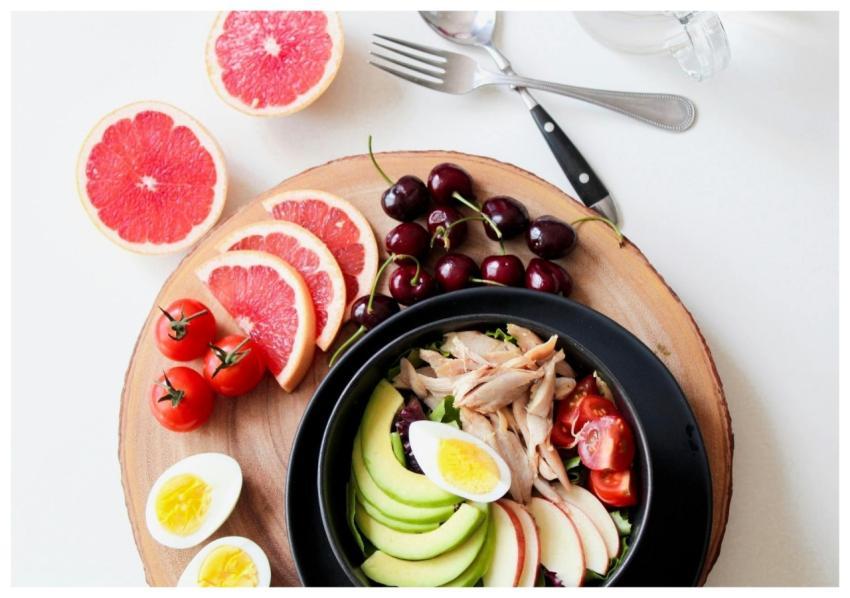 A vibrant breakfast flat lay featuring a mix of fr