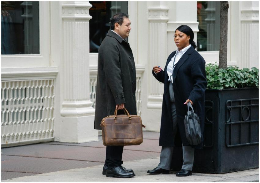 Full body of adult ethnic male manager in elegant