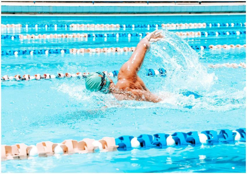 Energetic swimmer performing a stroke in a bright