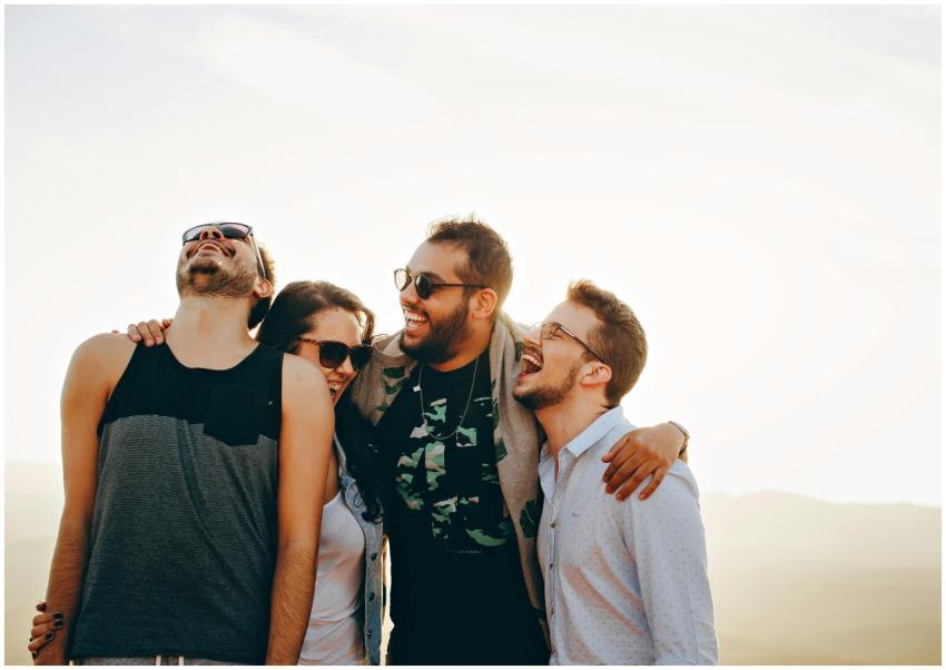 A group of young adults laughing and enjoying time