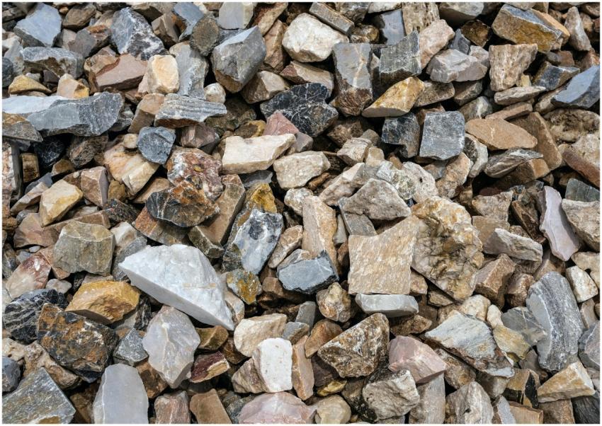 Close-up of assorted stones with rough textures, i
