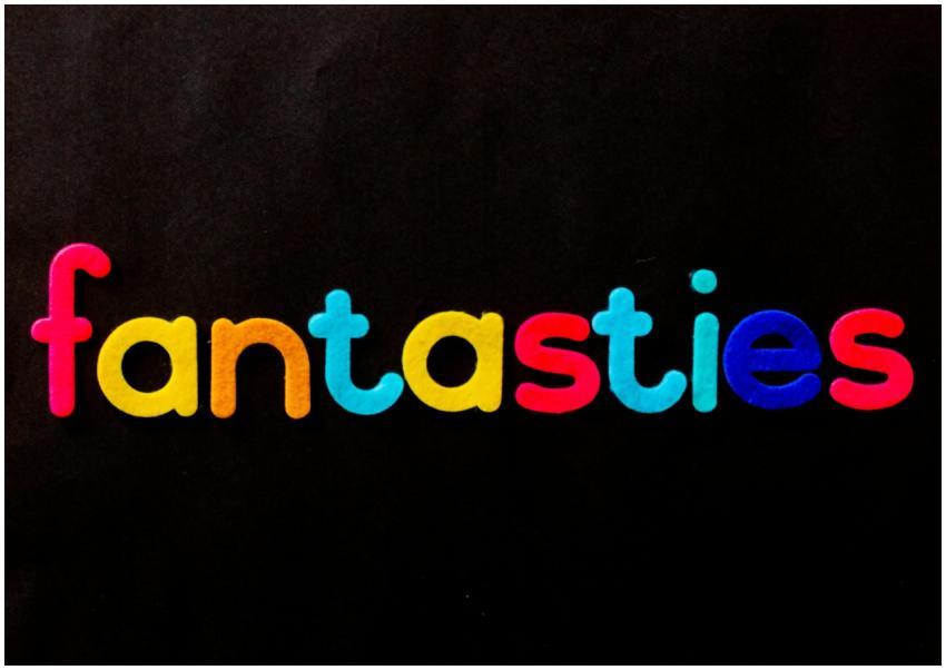 Bright and colorful lettering spelling 'fantasies'