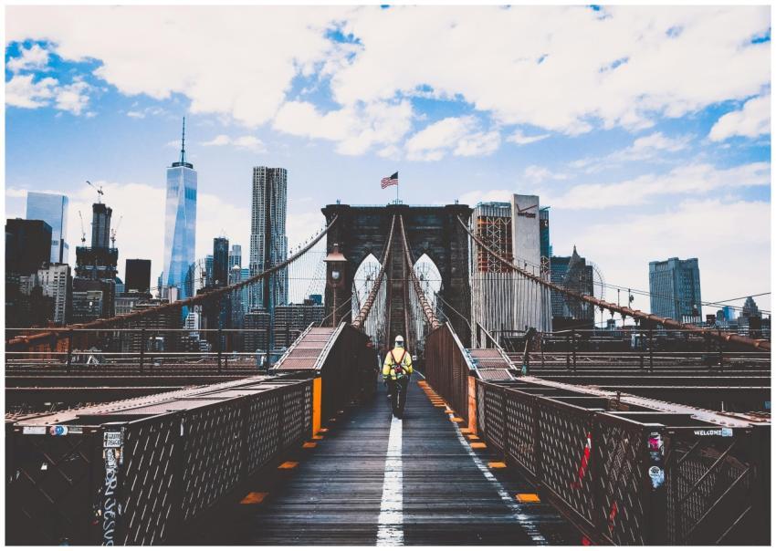 Iconic Brooklyn Bridge view with New York City sky