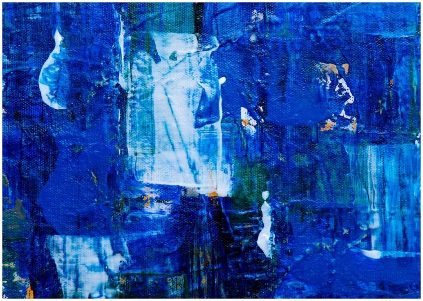 Vivid blue abstract art with layered textures on c