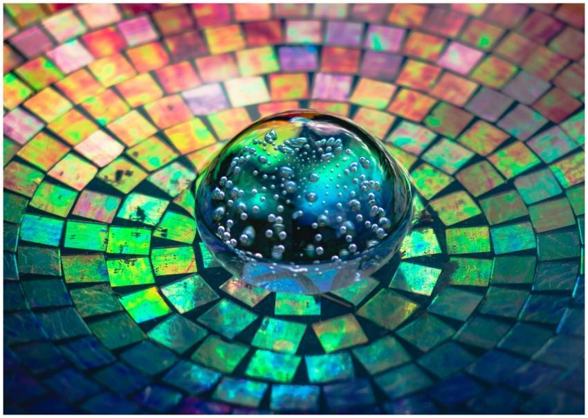 Colorful mosaic pattern with a glass bubble sphere