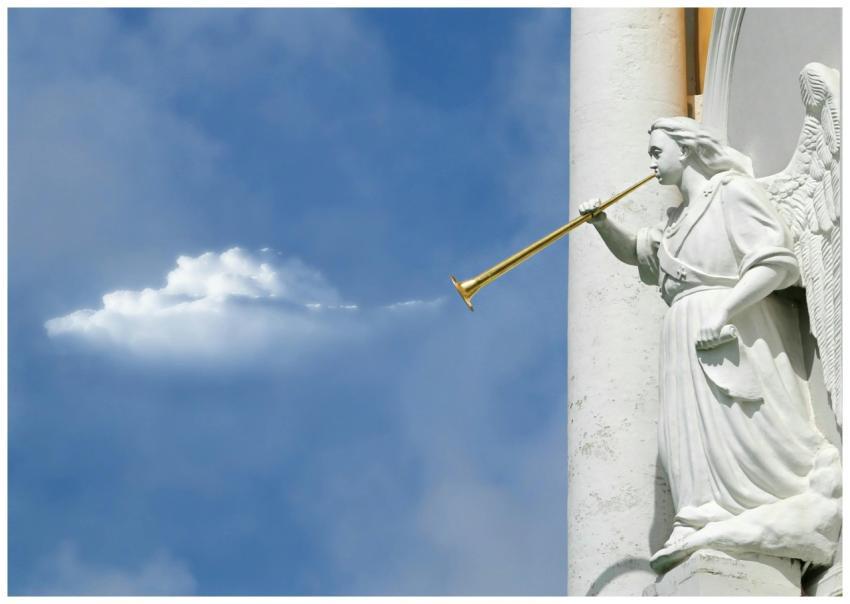 Sculpture of an angel with a trumpet, set against