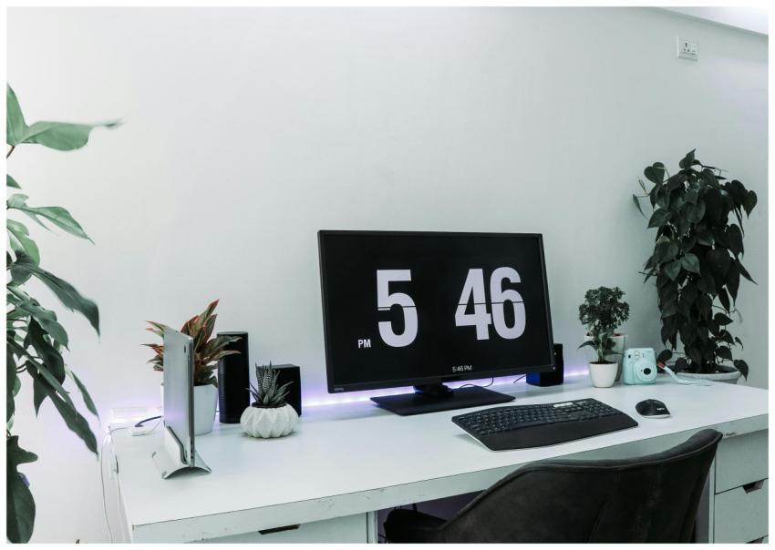 A sleek, contemporary desk setup featuring a monit