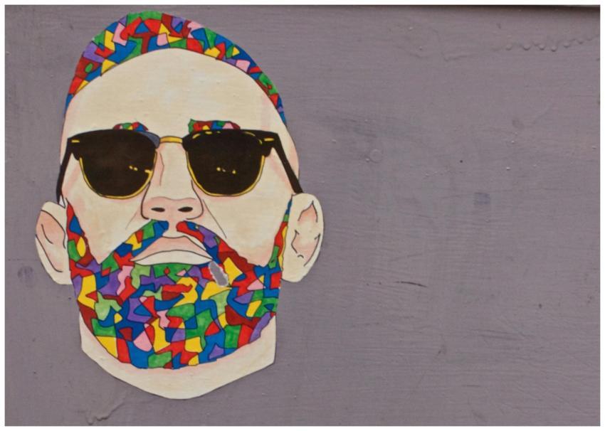 Abstract street art portrait of a man with colorfu