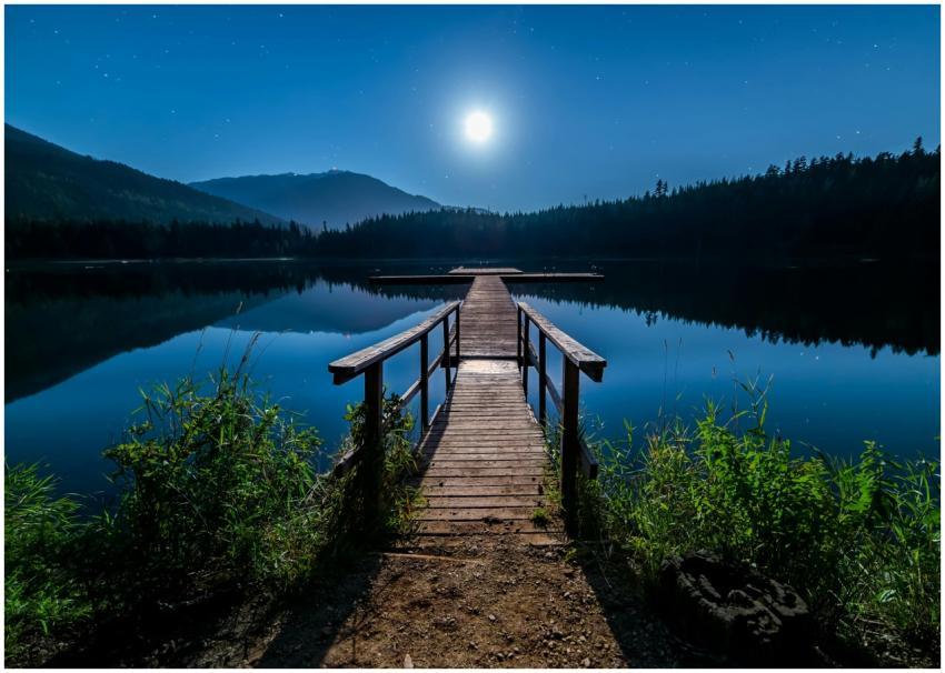 Discover tranquility at a moonlit dock in Whistler