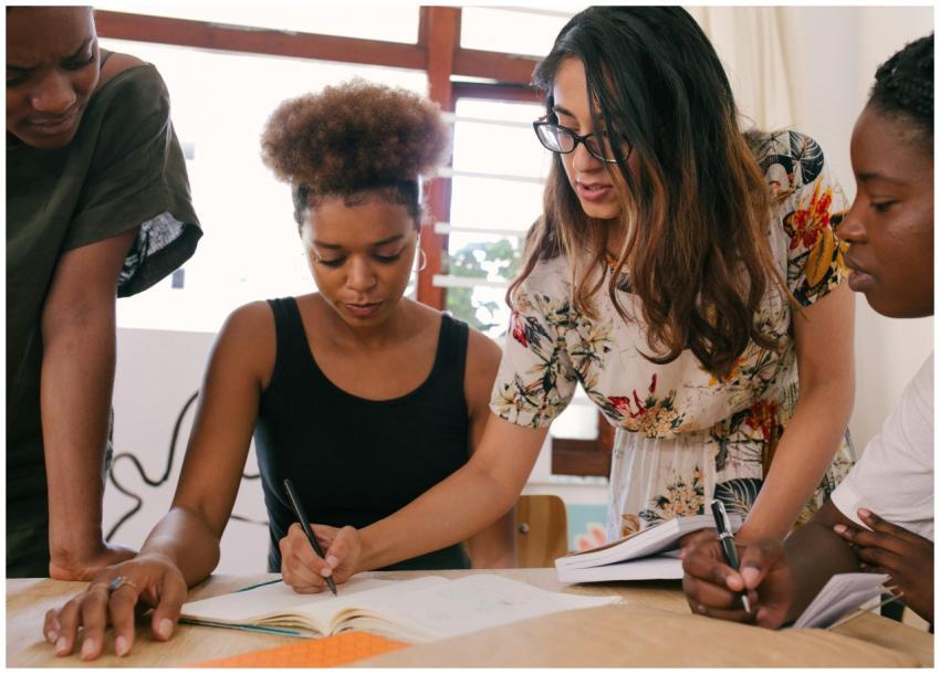 A group of diverse professionals collaborates on a